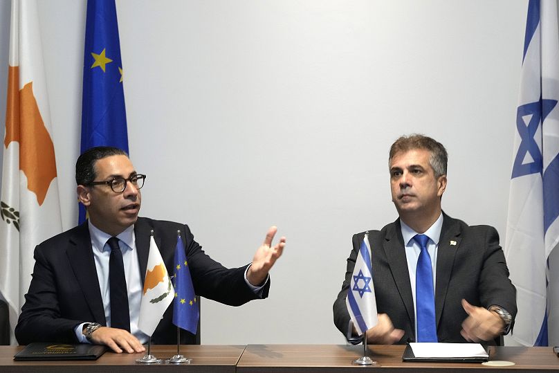 Israeli foreign minister Eli Cohen, right, meets with his Cypriot counterpart Constantinos Kombos