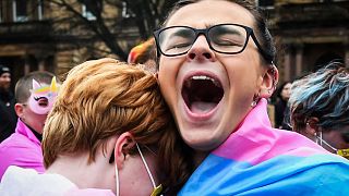 Trans Rights activists react while taking part in the "Furies against Fascism" counter protest to the "Let Women Speak" rally in Glasgow, on February 5, 2023.