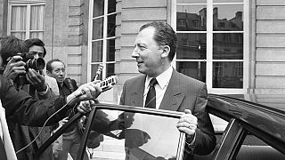 FILE - Jacques Delors leaving Hotel Matignon, Paris on July 19, 1984. 