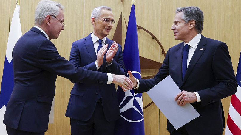 Finnish Foreign Minister Pekka Haavisto with the US Secretary of State and NATO Secretary General after signing the NATO ratification documents