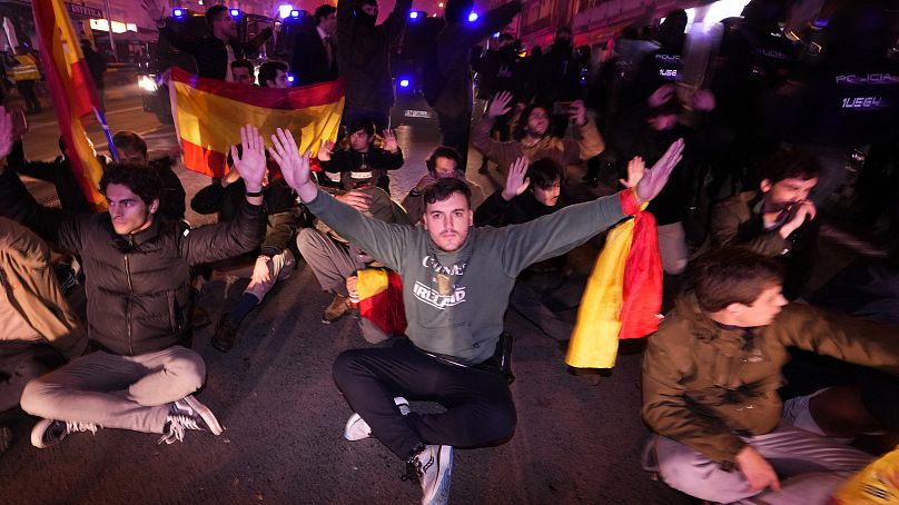 Demonstrators block the street during a protest against the amnesty at the headquarters of Socialist party in Madrid, Spain, November 16