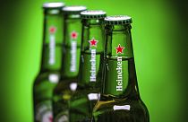 Bottles of Heineken beer are photographed in Washington, Friday, March 30, 2018. (AP Photo/J. David Ake)
