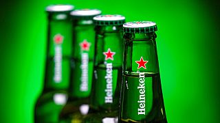 Bottles of Heineken beer are photographed in Washington, Friday, March 30, 2018.