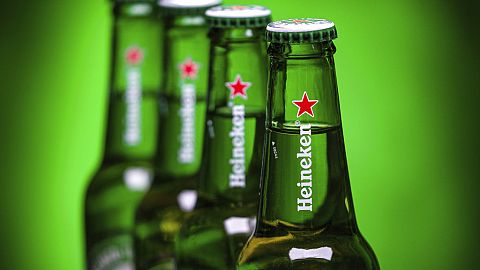 Bottles of Heineken beer are photographed in Washington, Friday, March 30, 2018. (AP Photo/J. David Ake)