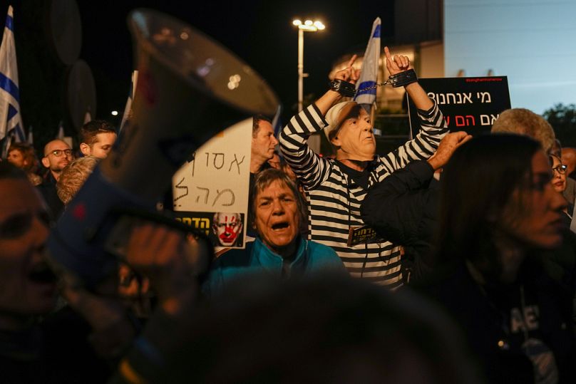 Israelis protest against Prime Minister Benjamin Netanyahu's government in Tel Aviv, Israel on Saturday