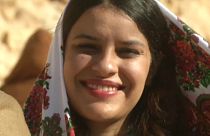 فتاة تونسية مشاركة في مهرجان الزيتون الجبلي في شنني والدويرات