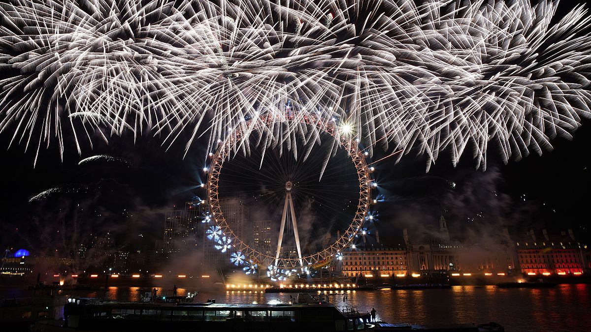 Fireworks light-up the sky over the London Eye in central London to celebrate the New Year on Monday, Jan. 1, 2024.