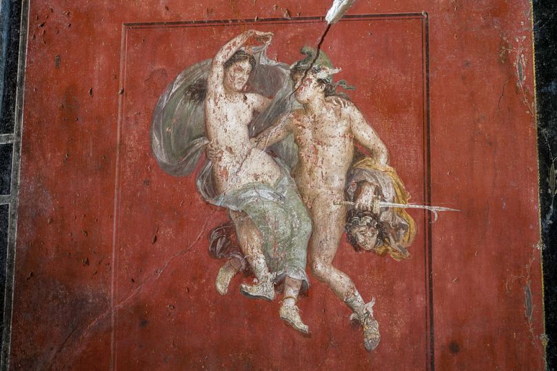 A detail of a fresco showing Perseus and Andromeda surrounded in a Pompeii red in one of the wealthiest homes in Pompeii, the House of the Vetti.