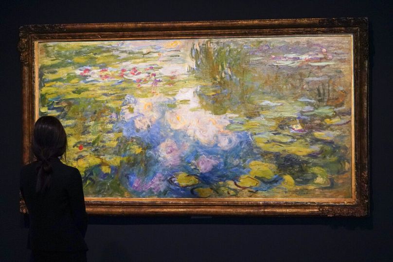 Claude Monet's "Le Bassin aux nymphéas" is displayed during a media preview for Sotheby's May evening auctions in New York.