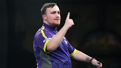 Luke Littler of England during the semifinal match against Scott Williams of England at the World Darts Championship, in London, Tuesday, Jan. 2, 2024.