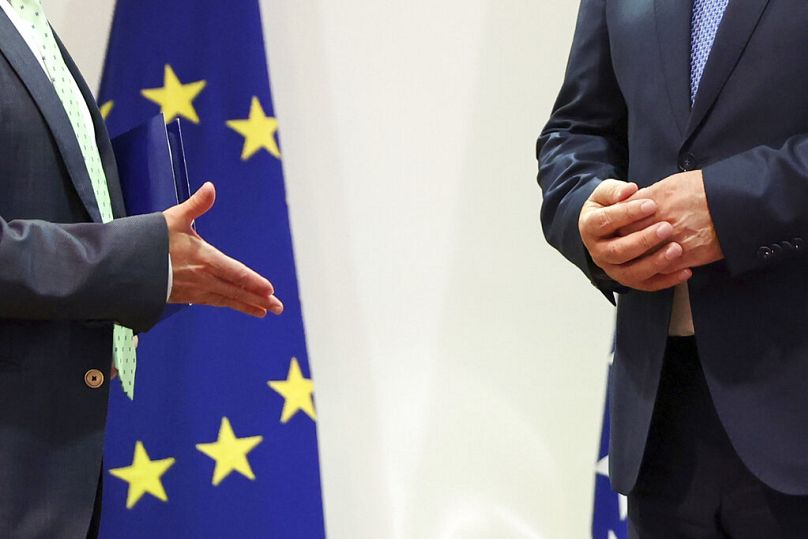 EU Mission Head Johann Sattler offers his hand for a handshake to the Chairman of the Council of Ministers of Bosnia and Herzegovina Zoran Tegeltija in Sarajevo, October 2022