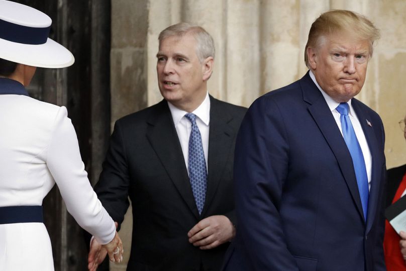 FILE - President Donald Trump, right, and first lady Melania Trump, left, accompanied by Britain's Prince Andrew, leave after a tour of Westminster Abbey in London, 2019.