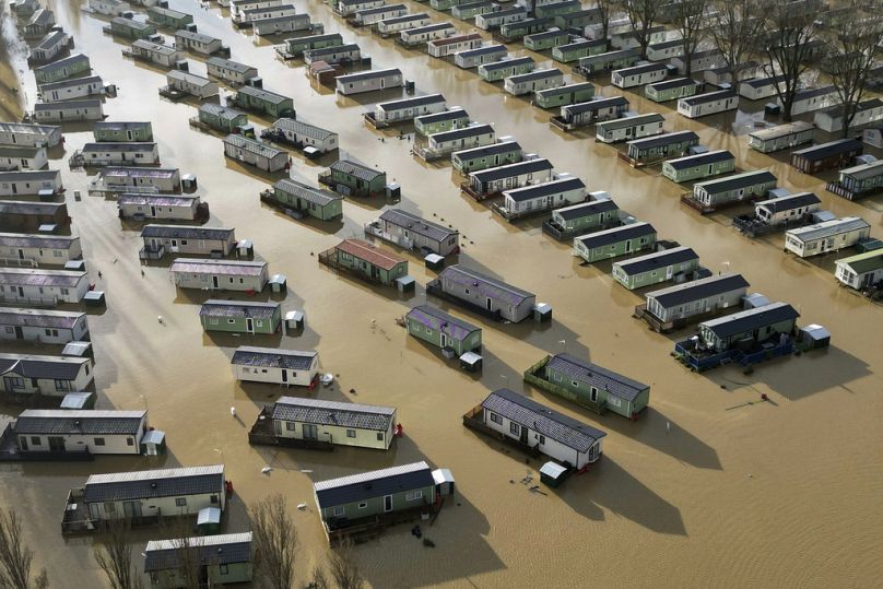 Holiday homes at the Billing Aquadrome in Northampton are surrounded by water caused by Storm Henk on Wednesday, Jan. 3, 2024.
