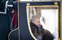 Denmark's Queen Margrethe is escorted by the Hussar Regiment as she rides in a horse-drawn coach from Christian IX's Palace, Amalienborg to Christiansborg Palace 