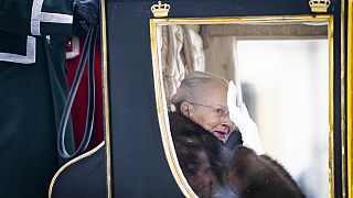 Denmark's Queen Margrethe is escorted by the Hussar Regiment as she rides in a horse-drawn coach from Christian IX's Palace, Amalienborg to Christiansborg Palace 