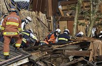 Rescuers conduct a search operation in Wajima, Ishikawa prefecture, Japan Friday, Jan. 5, 2024.