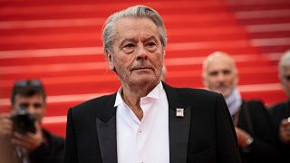 Alain Delon poses for photographers in 2019 shortly before his stroke