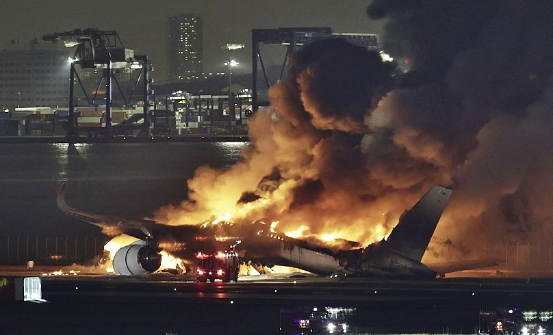 A Japan Airlines plane is on fire on the runway of Haneda airport on Tuesday, January 2, 2024 in Tokyo, Japan.