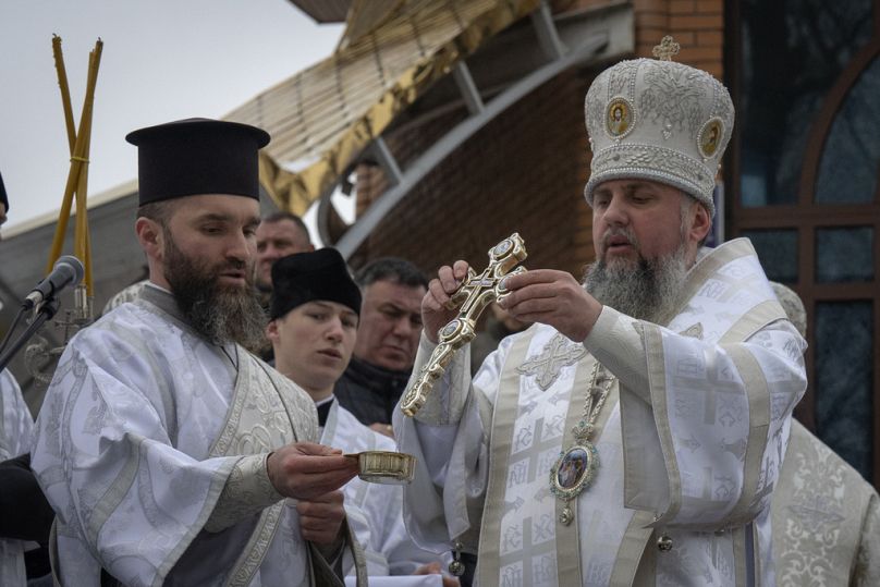 the head of the Ukrainian Orthodox Church, blesses water during a traditional Epiphany celebration in Kyiv, Ukraine.