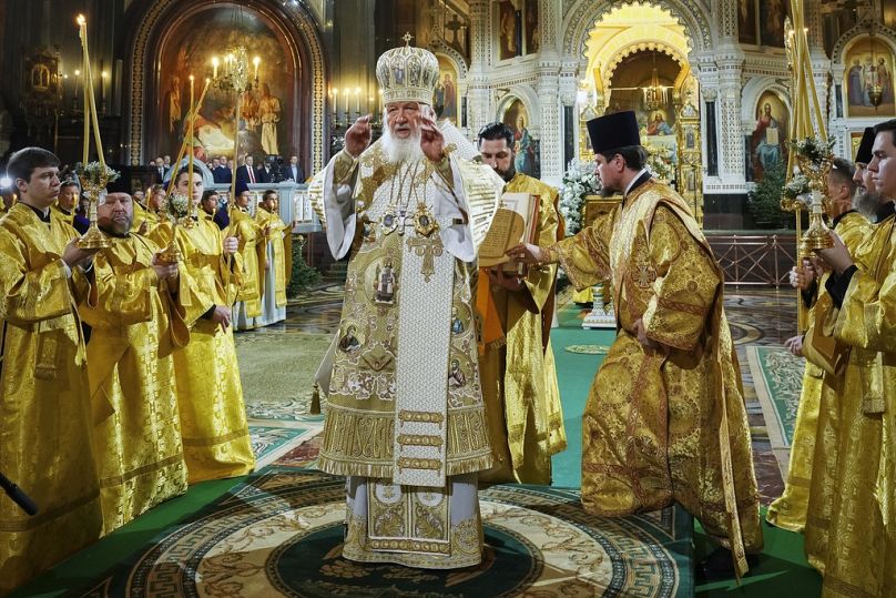 Russian Orthodox Patriarch Kirill, center, delivers the Christmas service in the Christ the Saviour Cathedral in Moscow.