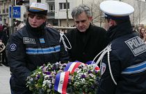 Charlie Hebdo publication director Laurent Sourisseau lays a wreath in tribute to police officer Ahmed Merabet, a victim of the jihadist attack, on 7 January, 2024.