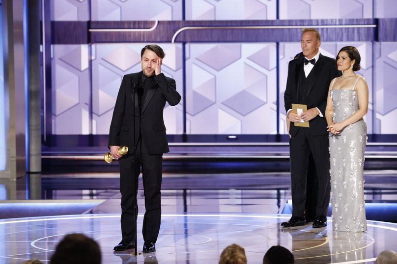 Kieran Culkin accepting the award for best performance by an actor in a drama series for his role in "Succession" during the 81st Annual Golden Globe Awards