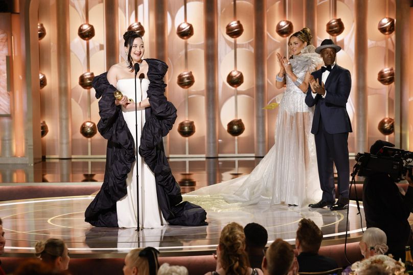 Lily Gladstone accepts the award for best female actor in motion picture - drama for her role in "Killers of the Flower Moon" during the Annual Golden Globes