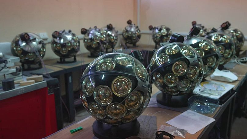 Each sphere is fitted with a hydrophone, an underwater device that detects and records ocean sounds from all directions.