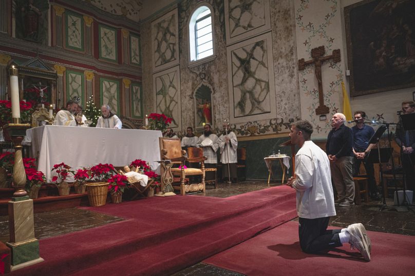 Shia LaBeouf participates in his Catholic confirmation ceremony at Old Mission Santa Inés Parish in Solvang, Calif., on Sunday, Dec. 31, 2023.