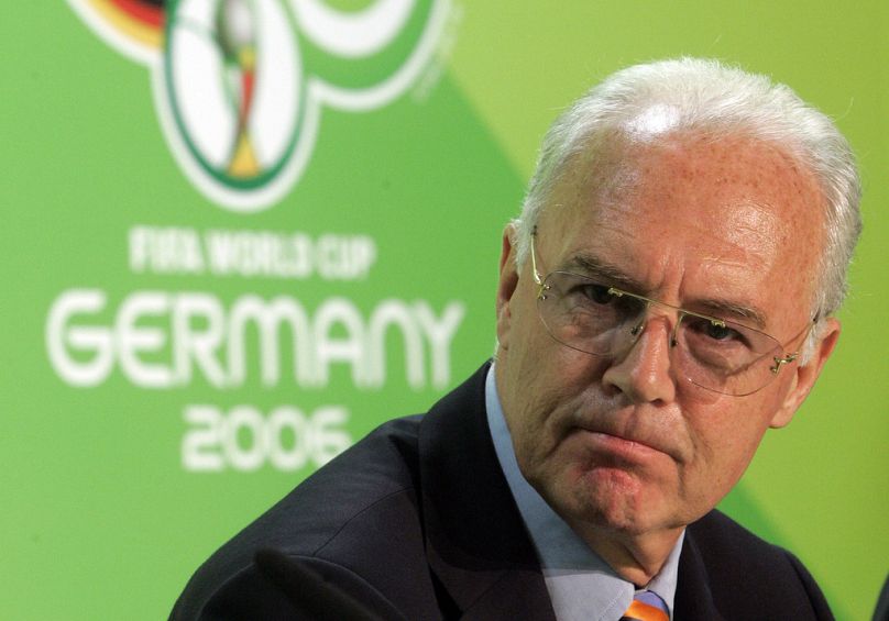 Franz Beckenbauer, then President of the German Organization Committee of the soccer World Cup briefs the media during a news conference at the Olympic Stadium in Berlin.