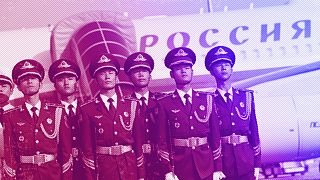 Chinese honor guards stand at attention after welcoming Russia's President Vladimir Putin on his arrival at Beijing Capital International Airport, October 2023
