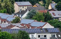 Solar panels are mounted on the roofs of apartment buildings in Bottrop, Germany, June 26, 2023. 