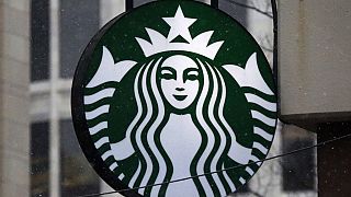 The Starbucks logo is seen, March 14, 2017, on a shop in downtown Pittsburgh.