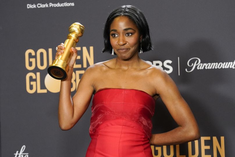 Ayo Edebiri poses with the award for best performance by an actress in a television series, musical or comedy for "The Bear" at the 81st Golden Globe Awards.