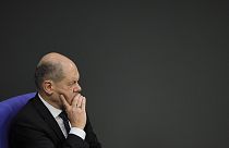 German Chancellor Olaf Scholz attends a debate about Germany's budget crisis at the parliament Bundestag in Berlin, Germany, Tuesday, Nov. 28, 2023.