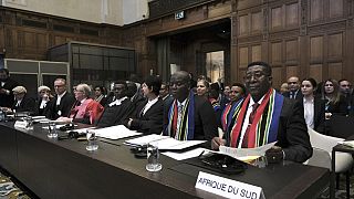 Rappresentanti legali e politici del Sud Africa all'interno della Corte Internazionale di Giustizia a L'Aia, nei Paesi Bassi.