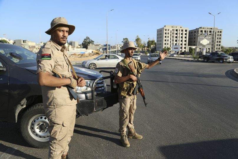 Libyan security forces stand guard in Tripoli, August 2023