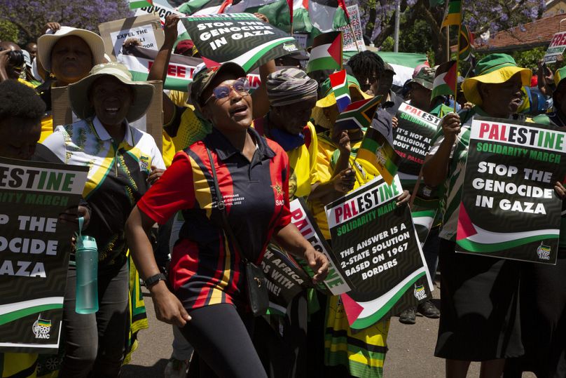 Pro-Palestinian supporters demonstrate at the entrance to the Israeli embassy in Pretoria, October 2023
