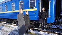 Britain's Prime Minister Rishi Sunak, right, arrives in Kyiv, Ukraine, to meet with President Volodymyr Zelensky, 12 January 2024