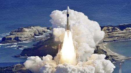 An H2A rocket is lifted from the launch pad at Tanegashima Space Centre in Kagoshima, southern Japan.