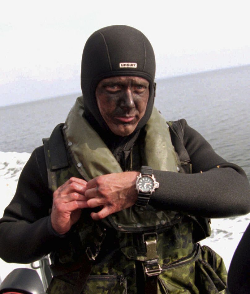 Denmark's Crown Prince Freserik takes part in a military drill as an aspirant to the Danish Navy's elite Frogmen Corps in 1995