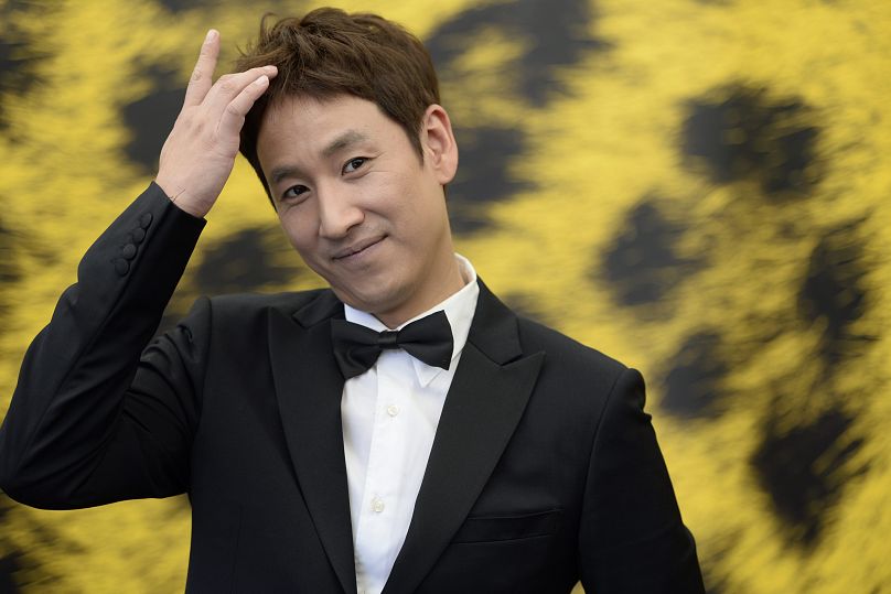 Lee Sun-kyun poses during the photo call for the movie "U ri Sunhi" at the 66th Locarno International Film Festival, Saturday, Aug. 10, 2013