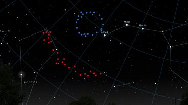 An artistic impression of what the Big Ring (shown in blue) and Giant Arc (shown in red) would look like in the sky. 