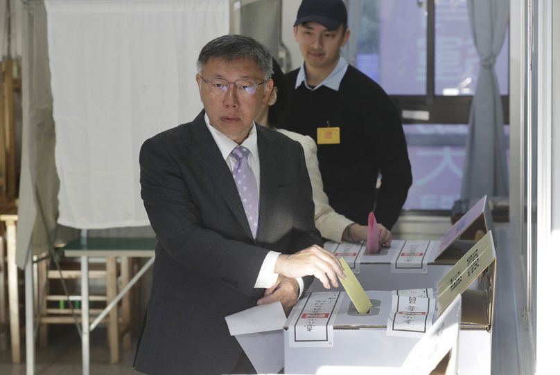 Taiwan People's Party (TPP) presidential candidate Ko Wen-je casts his ballot at a polling station in Taipei, Taiwan on Saturday