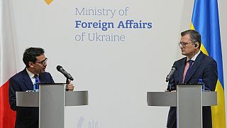 Ukraine's Foreign Minister Dmytro Kuleba, right, and his French counterpart Stephane Sejourne attend a joint press conference in Kyiv, Ukraine on Saturday