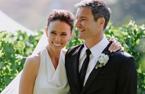 Former New Zealand Prime Minister Jacinda Ardern embraces her husband Clarke Gayford at their wedding in Havelock North, New Zealand on Saturday