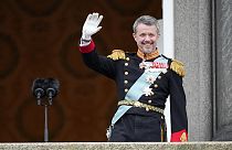 Denmark's new King Frederik X waves from the balcony of Christiansborg Palace in Copenhagen, Denmark on Sunday
