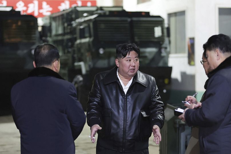 North Korean leader Kim Jong Un, center, inspects as he tours munitions factories in North Korea on 8 - 9 January