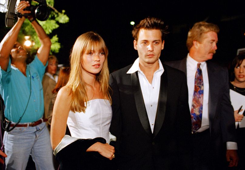 Kate Moss and her at-the-time boyfriend Johnny Depp are seen arriving for the premiere of Depp's film "Don Juan DeMarco," in Beverly Hills, 3 April 1995.