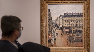 The Impressionist painting 'Rue St.-Honore, Apres-Midi, Effet de Pluie' painted in 1897 by Camille Pissarro on display at the Thyssen-Bornemisza Museum in Madrid.